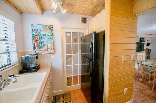 a bathroom with a sink and a shower
