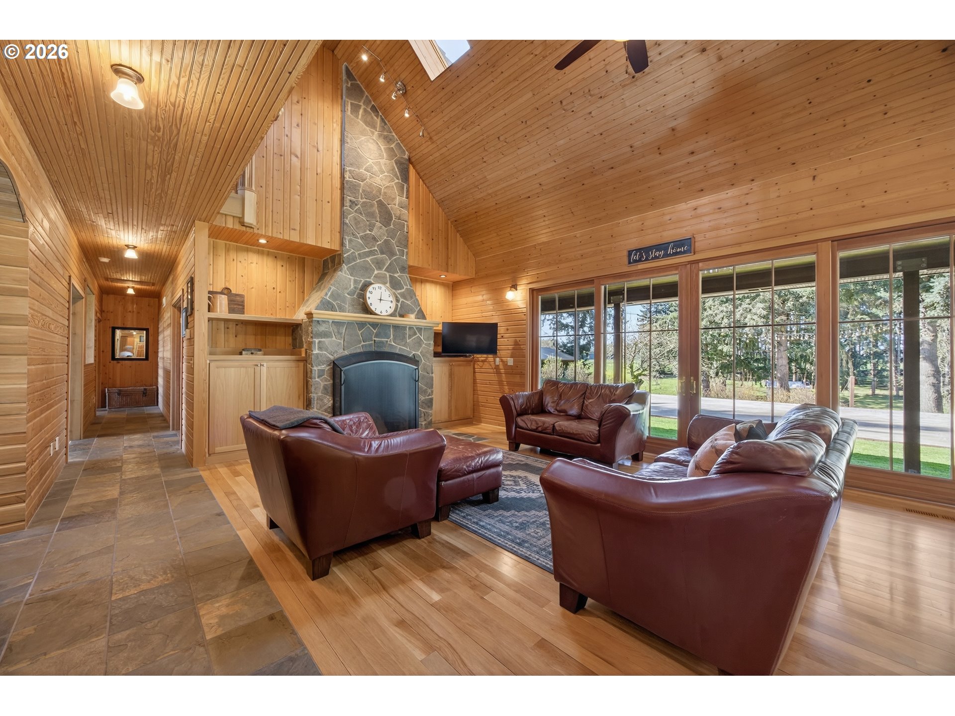 17765 Monnier Road Northeast Hubbard, OR 97032 - Photo 11 of 48 a living room with furniture and a fireplace