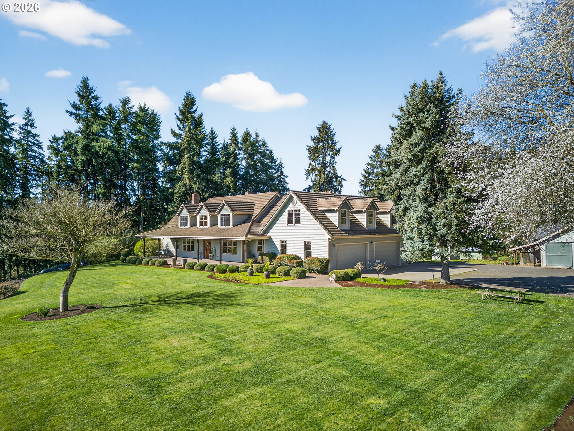 17765 Monnier Road Northeast Hubbard, OR 97032 - Photo 2 of 48 a front view of a house with a yard