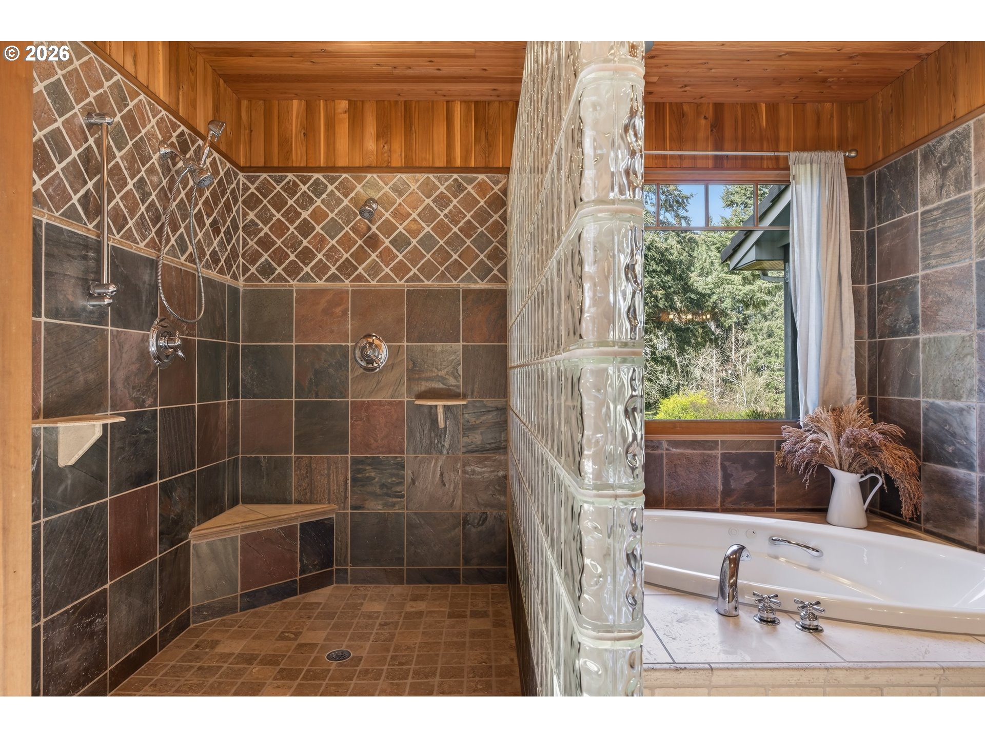 17765 Monnier Road Northeast Hubbard, OR 97032 - Photo 21 of 48 a bathroom with a bathtub and a window