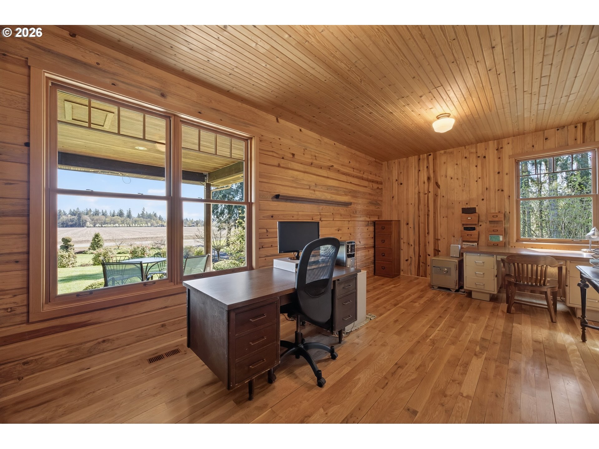 17765 Monnier Road Northeast Hubbard, OR 97032 - Photo 23 of 48 a living room with furniture and a wooden floor