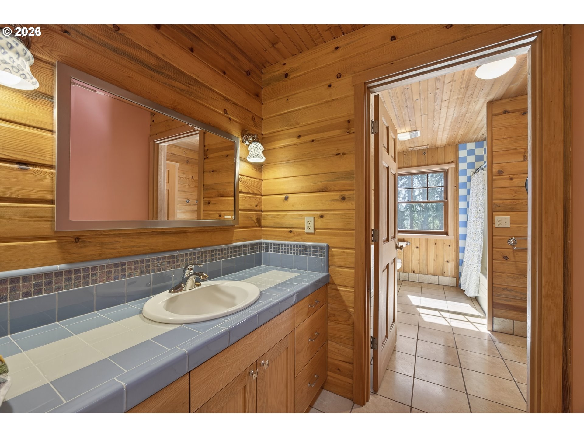 17765 Monnier Road Northeast Hubbard, OR 97032 - Photo 28 of 48 a bathroom with a sink vanity granite and a mirror
