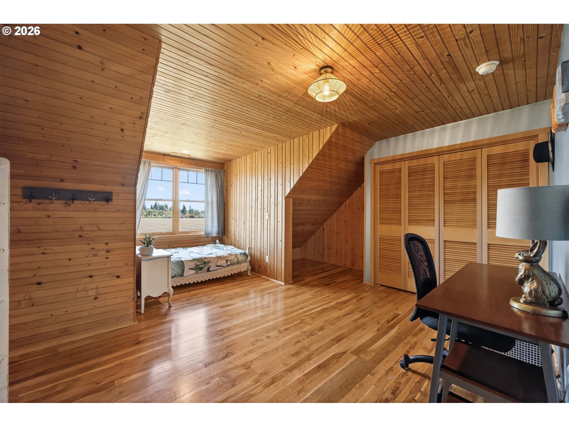 17765 Monnier Road Northeast Hubbard, OR 97032 - Photo 30 of 48 a view of a workspace with furniture and a potted plant