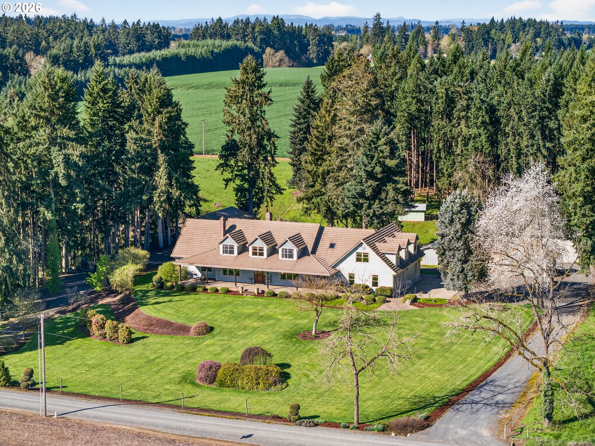 17765 Monnier Road Northeast Hubbard, OR 97032 - Photo 3 of 48 a view of a house with a yard