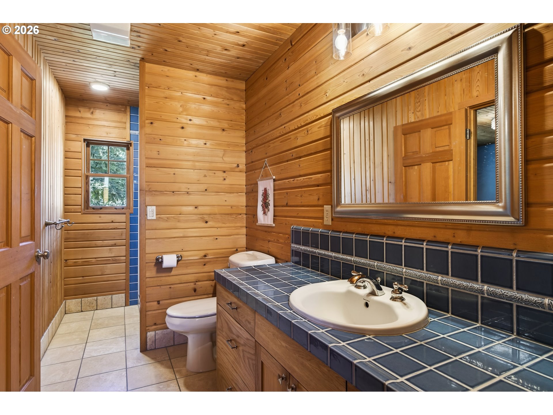 17765 Monnier Road Northeast Hubbard, OR 97032 - Photo 32 of 48 a bathroom with a sink a toilet and shower