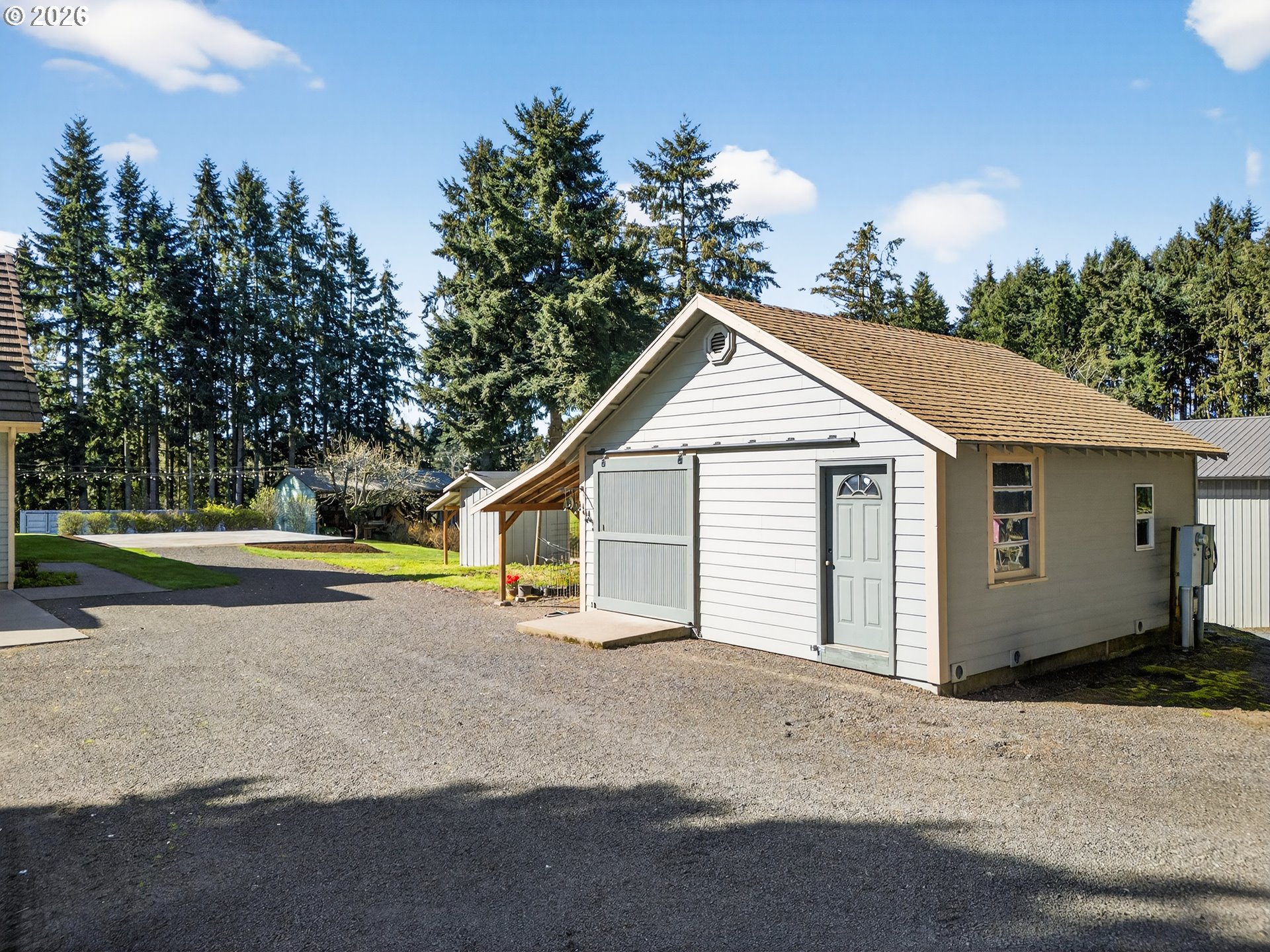 17765 Monnier Road Northeast Hubbard, OR 97032 - Photo 39 of 48 a view of a house with backyard and trees