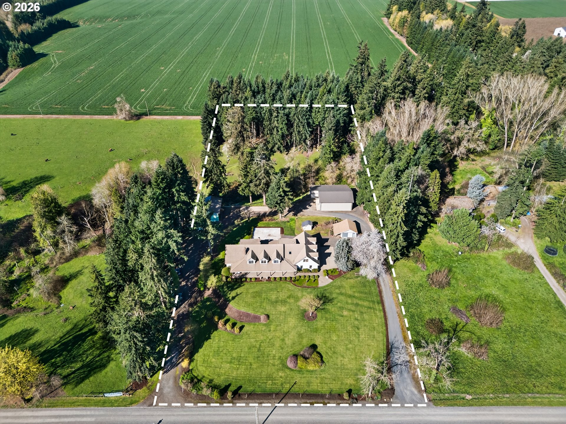 17765 Monnier Road Northeast Hubbard, OR 97032 - Photo 47 of 48 an aerial view of a residential houses with outdoor space and trees all around