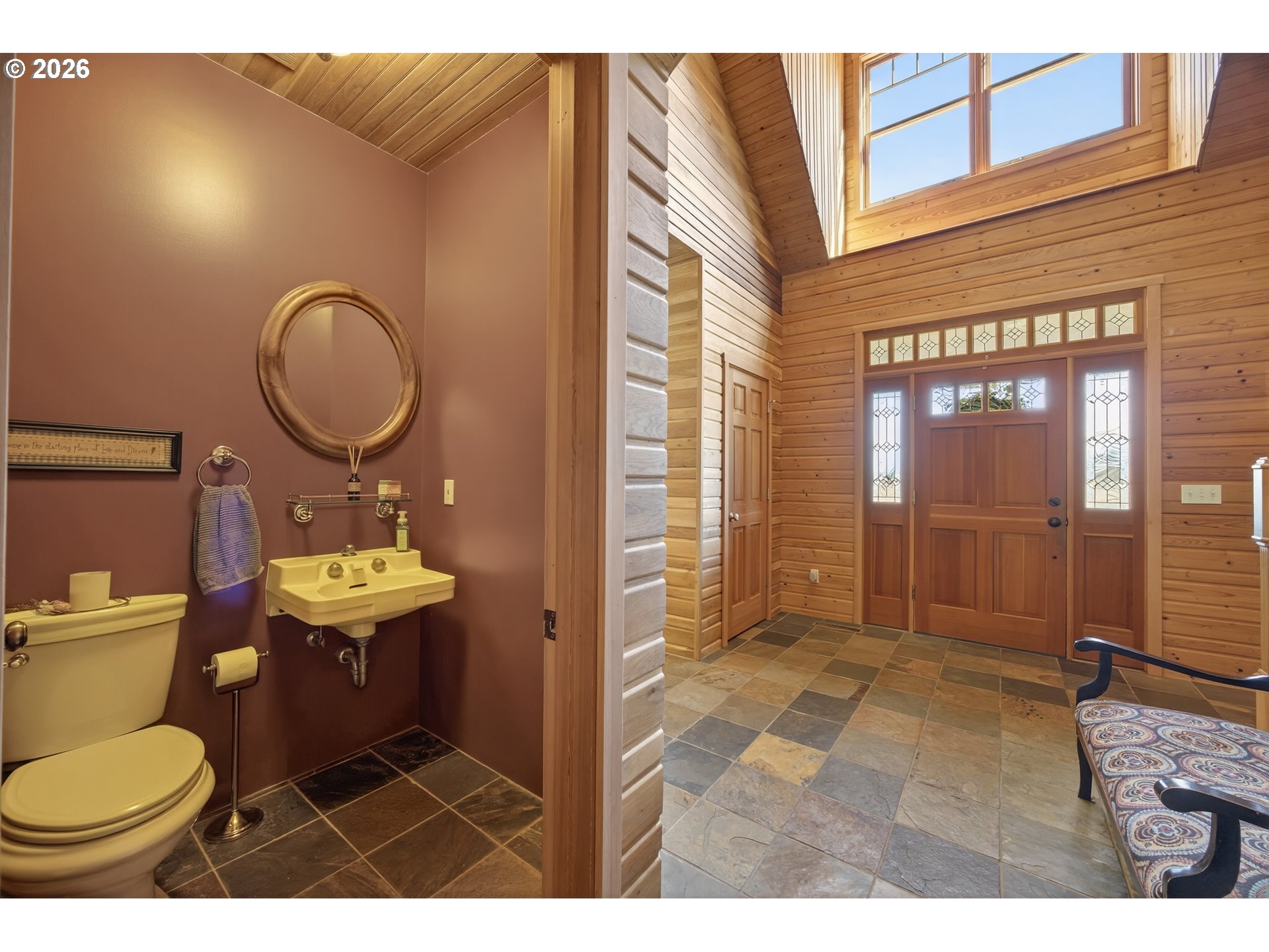 17765 Monnier Road Northeast Hubbard, OR 97032 - Photo 10 of 48 a bathroom with a toilet sink vanity and mirror