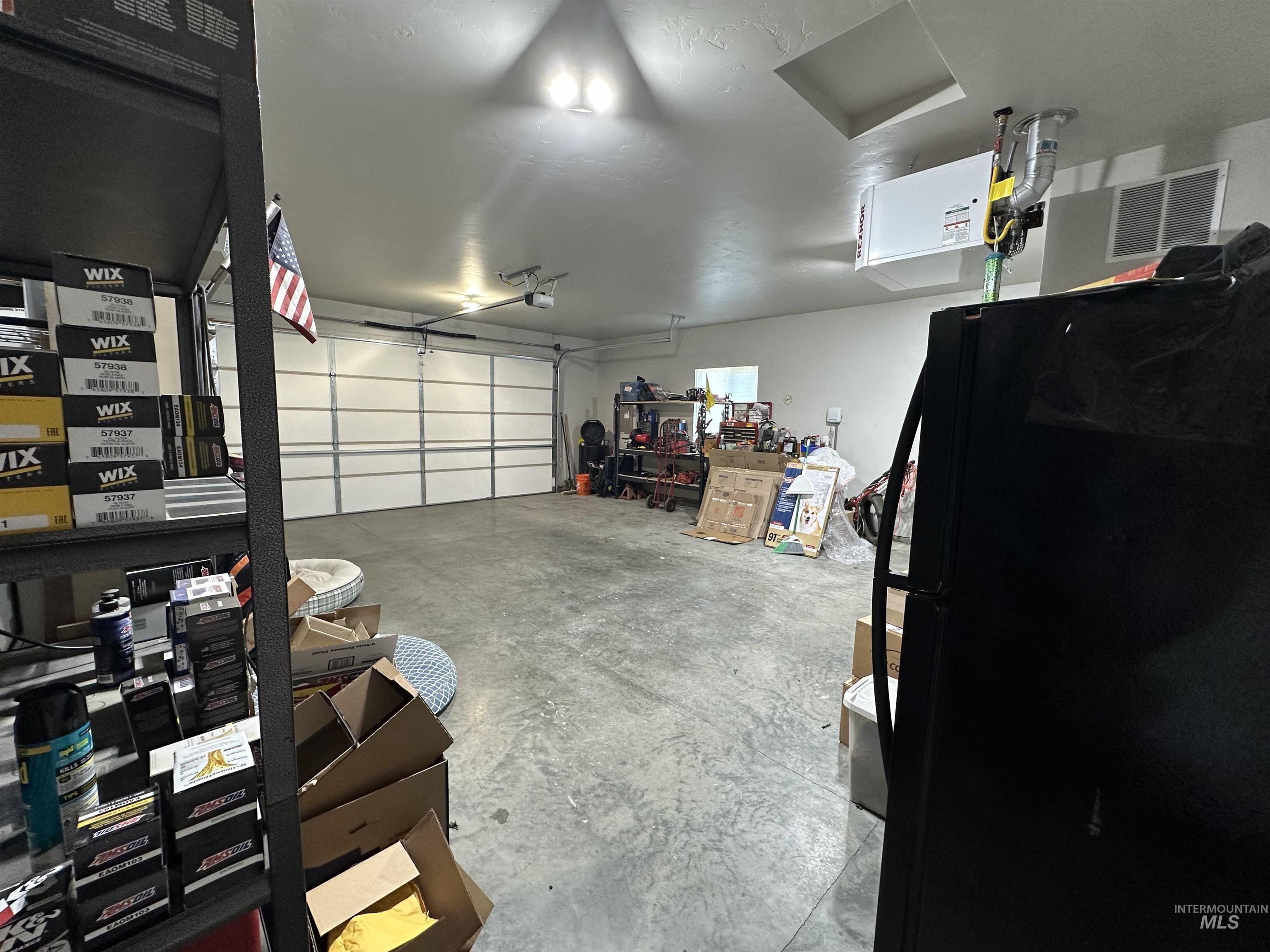 225 Slate Springs Kimberly, ID 83341 - Photo 27 of 45 Garage featuring freestanding refrigerator