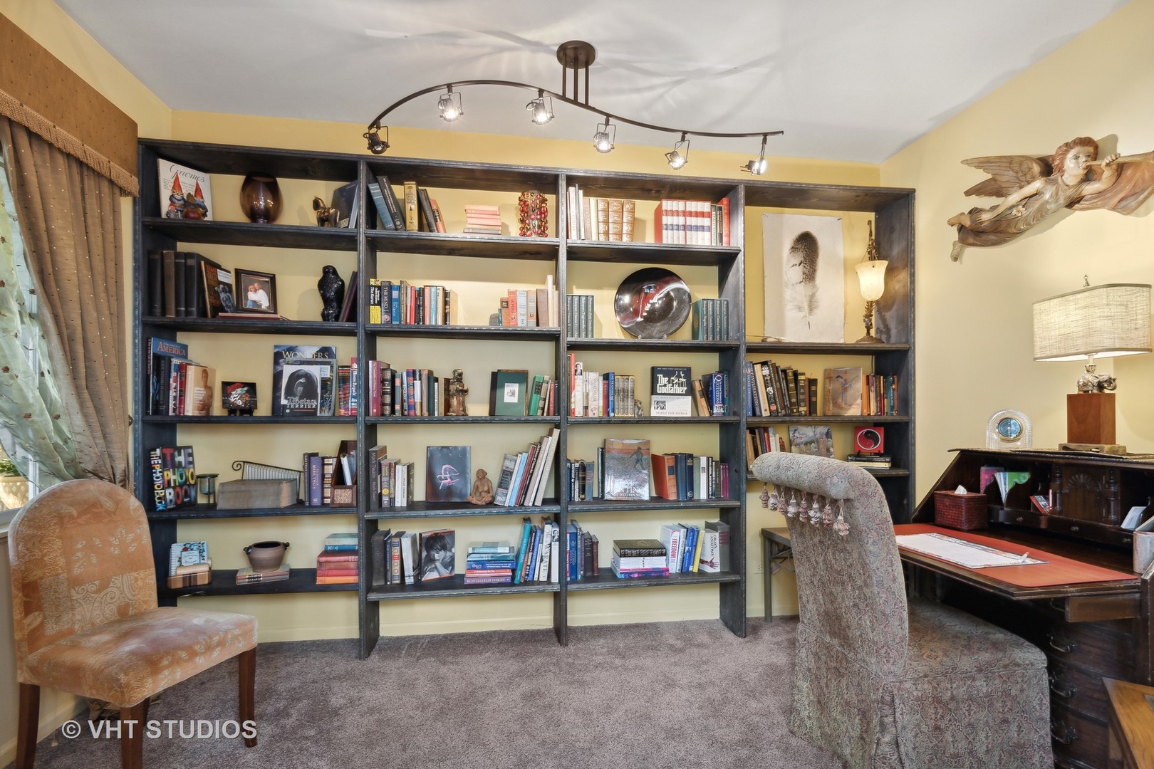 6265 Murifield Drive Gurnee, IL 60031 - Photo 11 of 30 a living room with lots of furniture and a book shelf