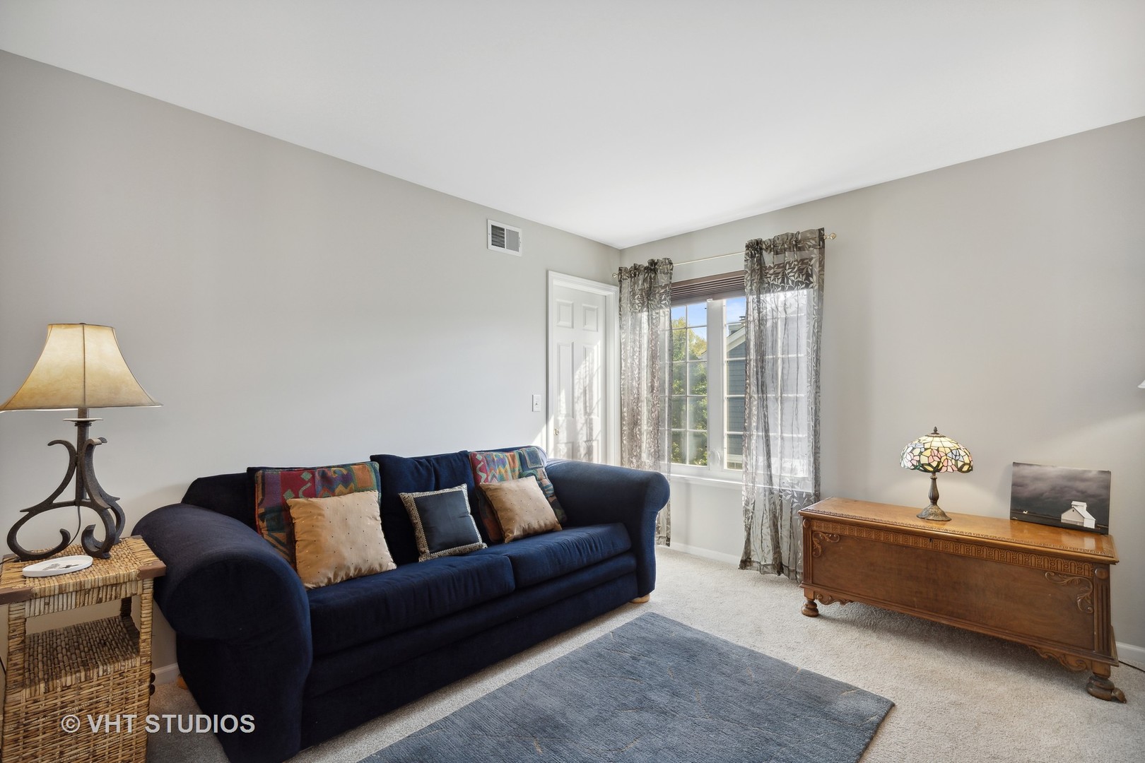 6265 Murifield Drive Gurnee, IL 60031 - Photo 16 of 30 a living room with furniture and a window