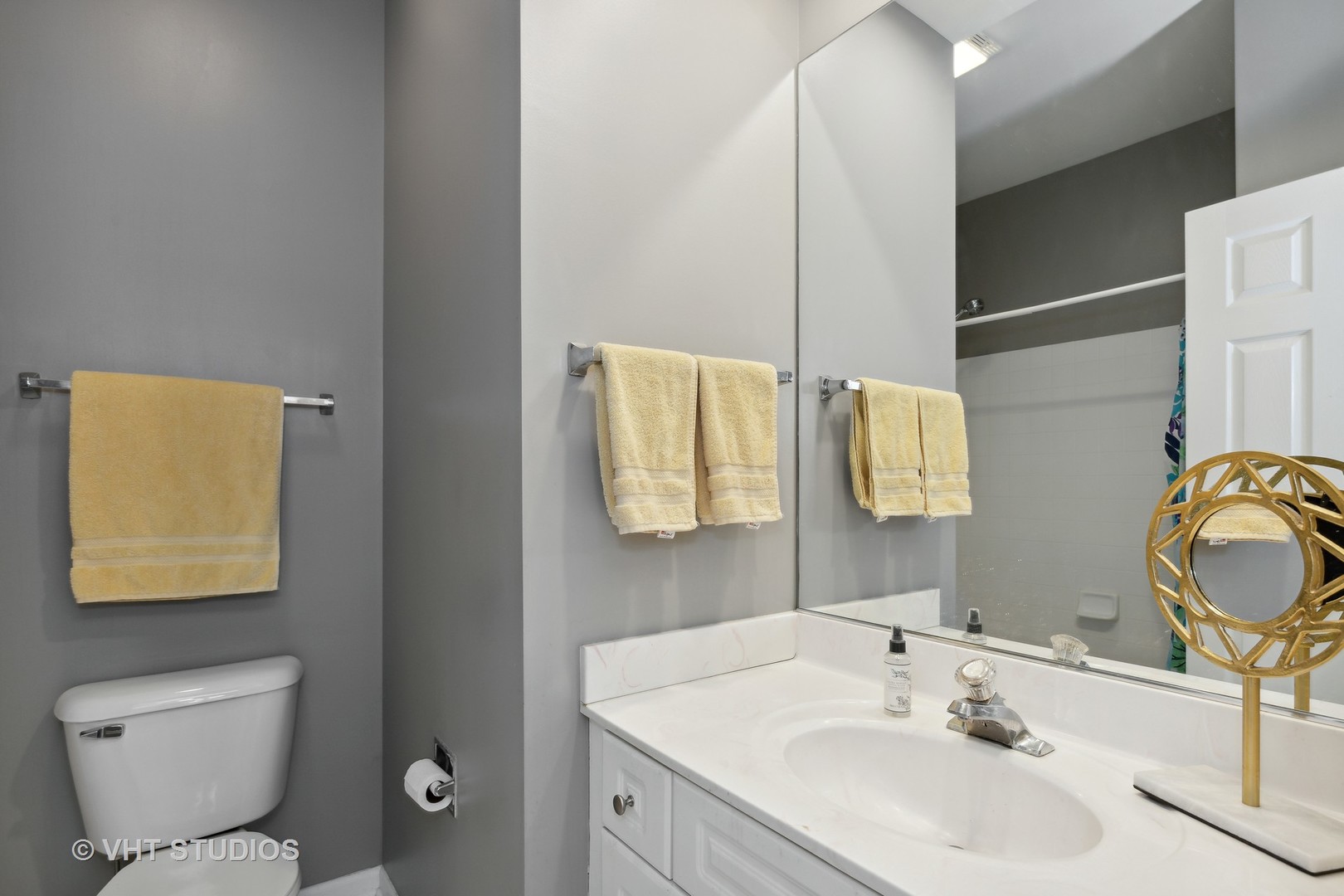 6265 Murifield Drive Gurnee, IL 60031 - Photo 18 of 30 a bathroom with a sink and a mirror