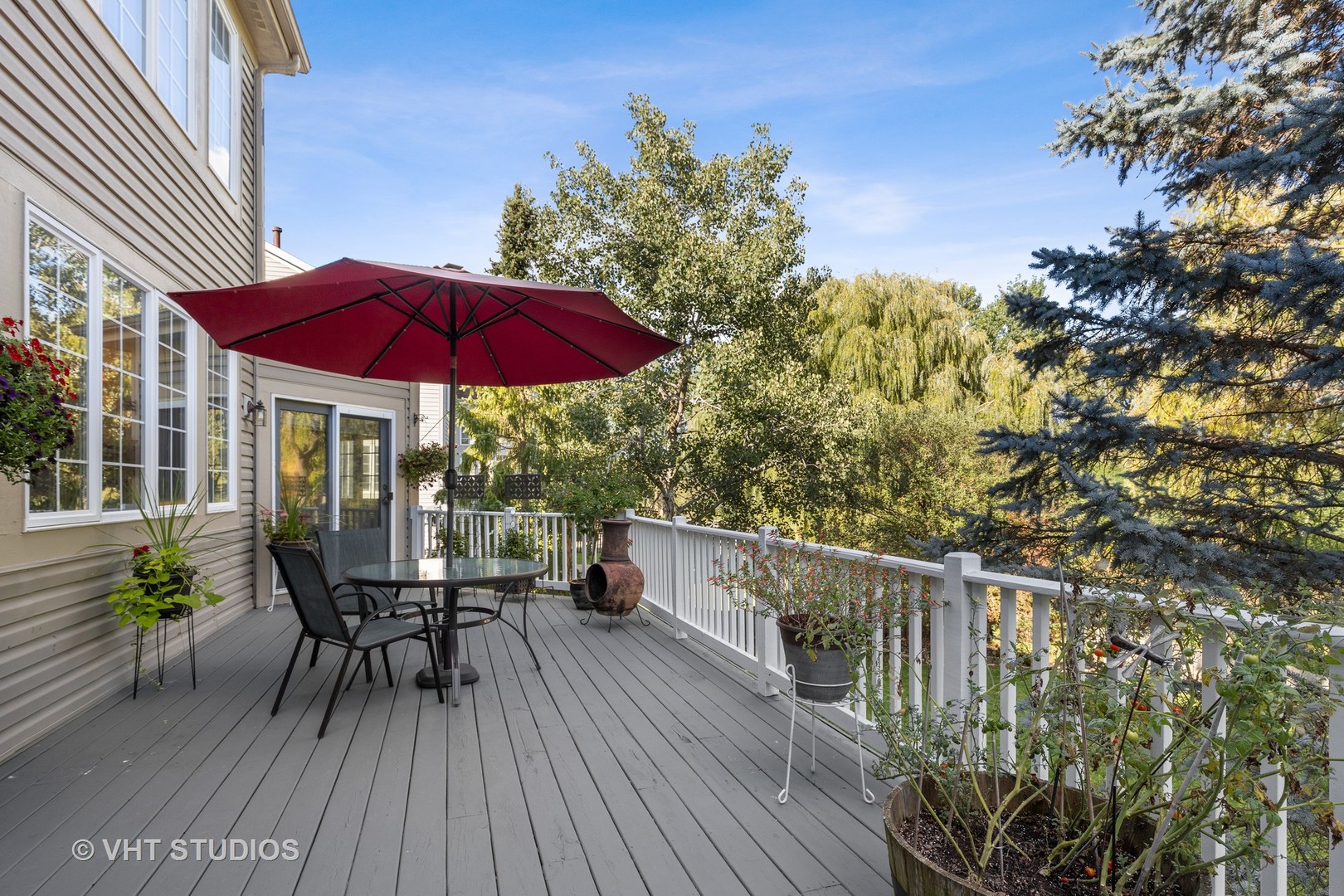 6265 Murifield Drive Gurnee, IL 60031 - Photo 22 of 30 a view of balcony with outdoor seating and wooden floor