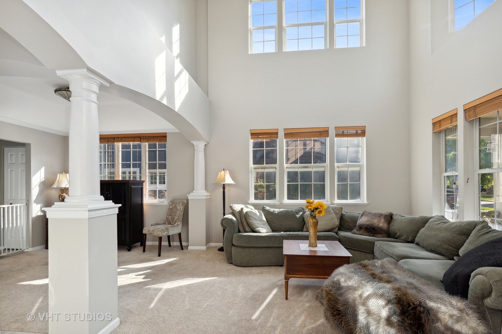 6265 Murifield Drive Gurnee, IL 60031 - Photo 3 of 30 a living room with furniture and large windows