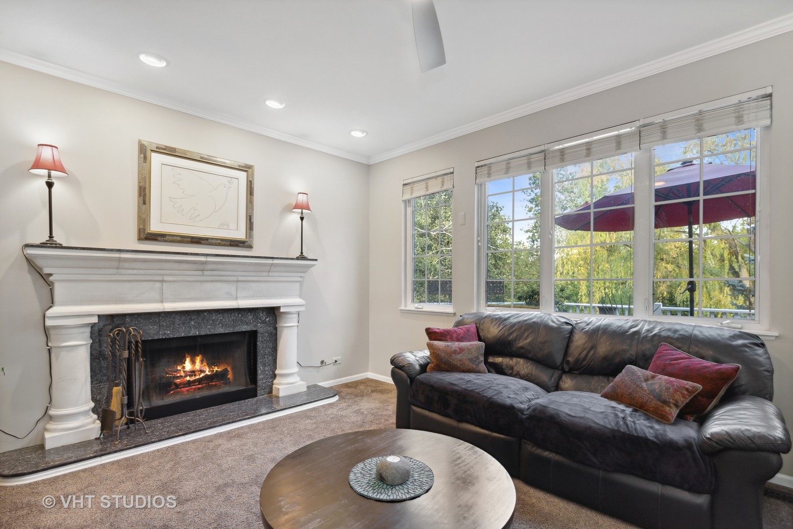 6265 Murifield Drive Gurnee, IL 60031 - Photo 10 of 30 a living room with furniture a window and a fireplace