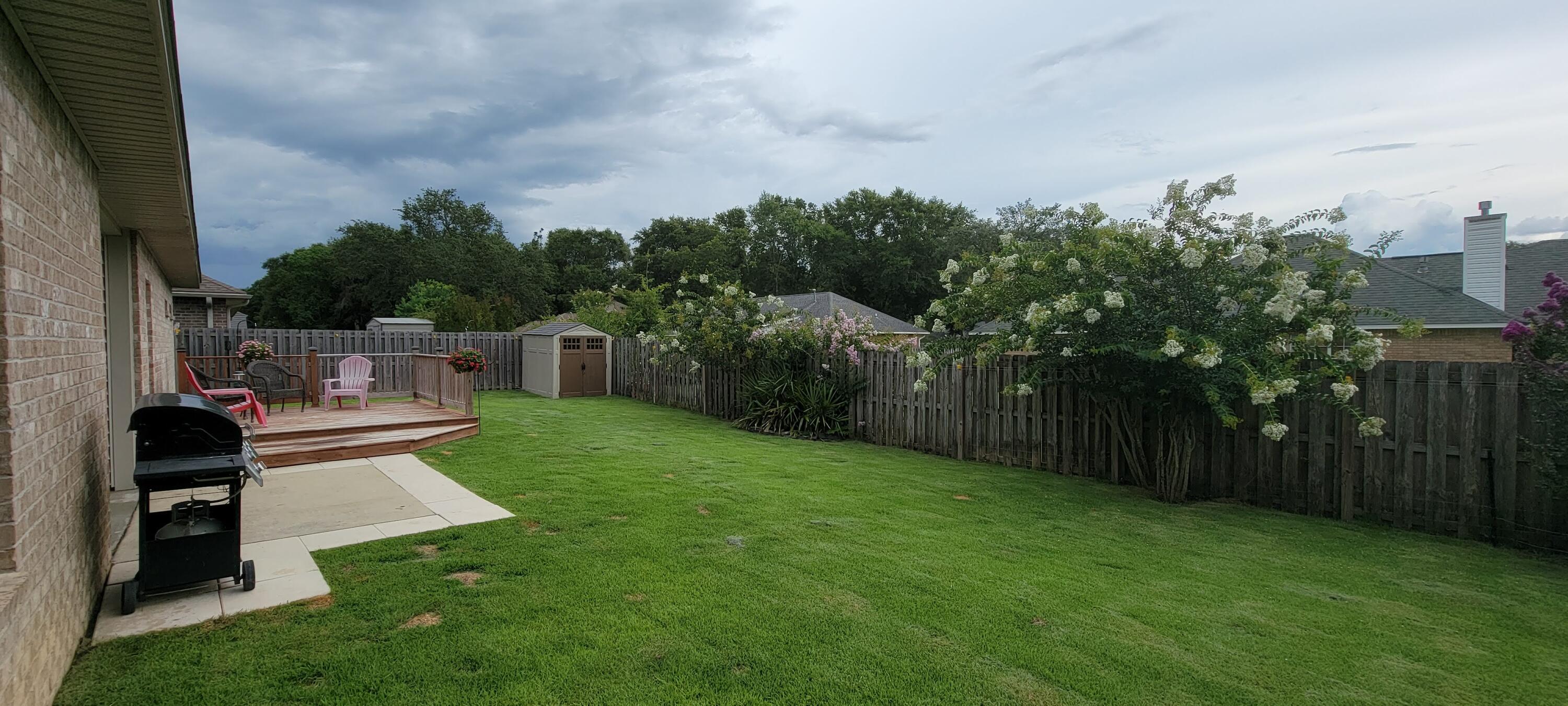 4598 Hermosa Road Crestview, FL 32539 - Photo 14 of 31 a view of a backyard