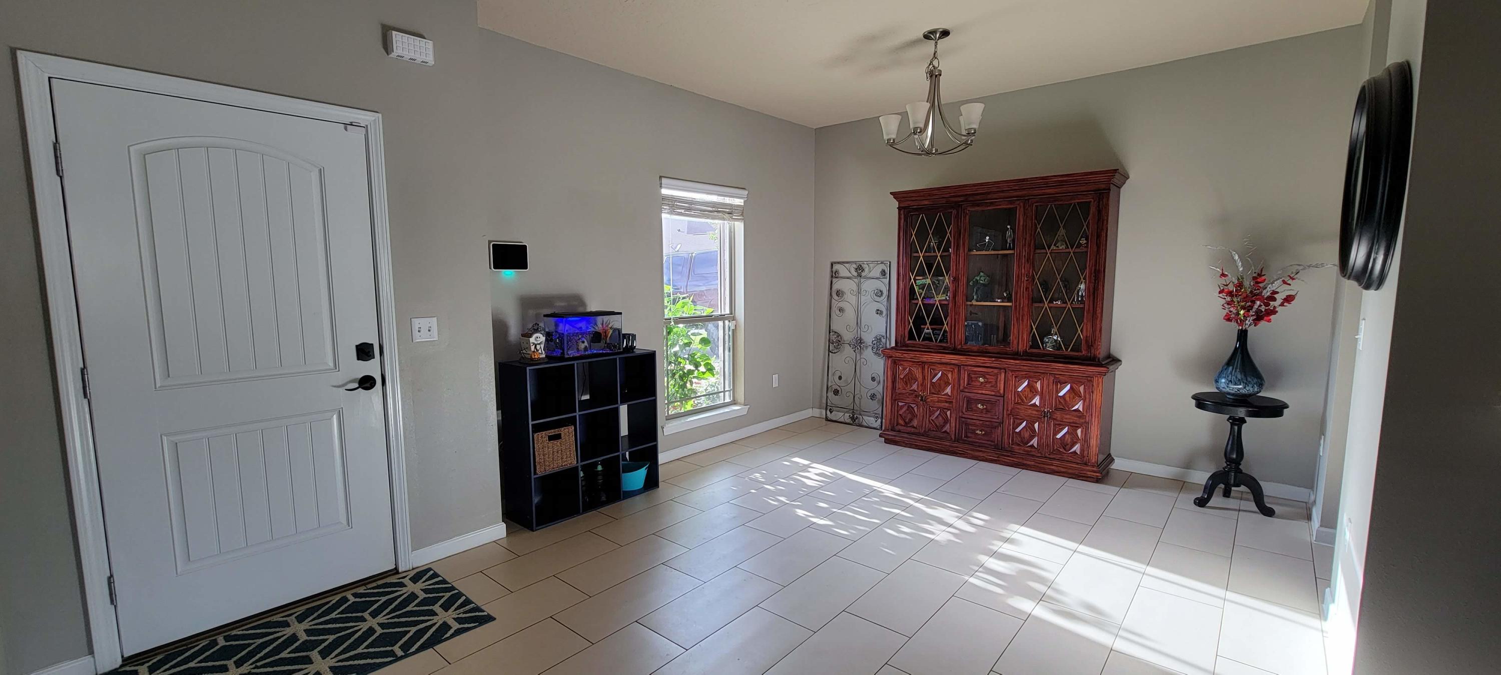 4598 Hermosa Road Crestview, FL 32539 - Photo 3 of 31 a living room with furniture and wooden floor