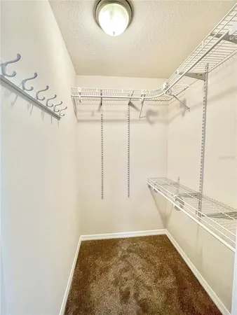 a view of a bathroom with a tub and a shower