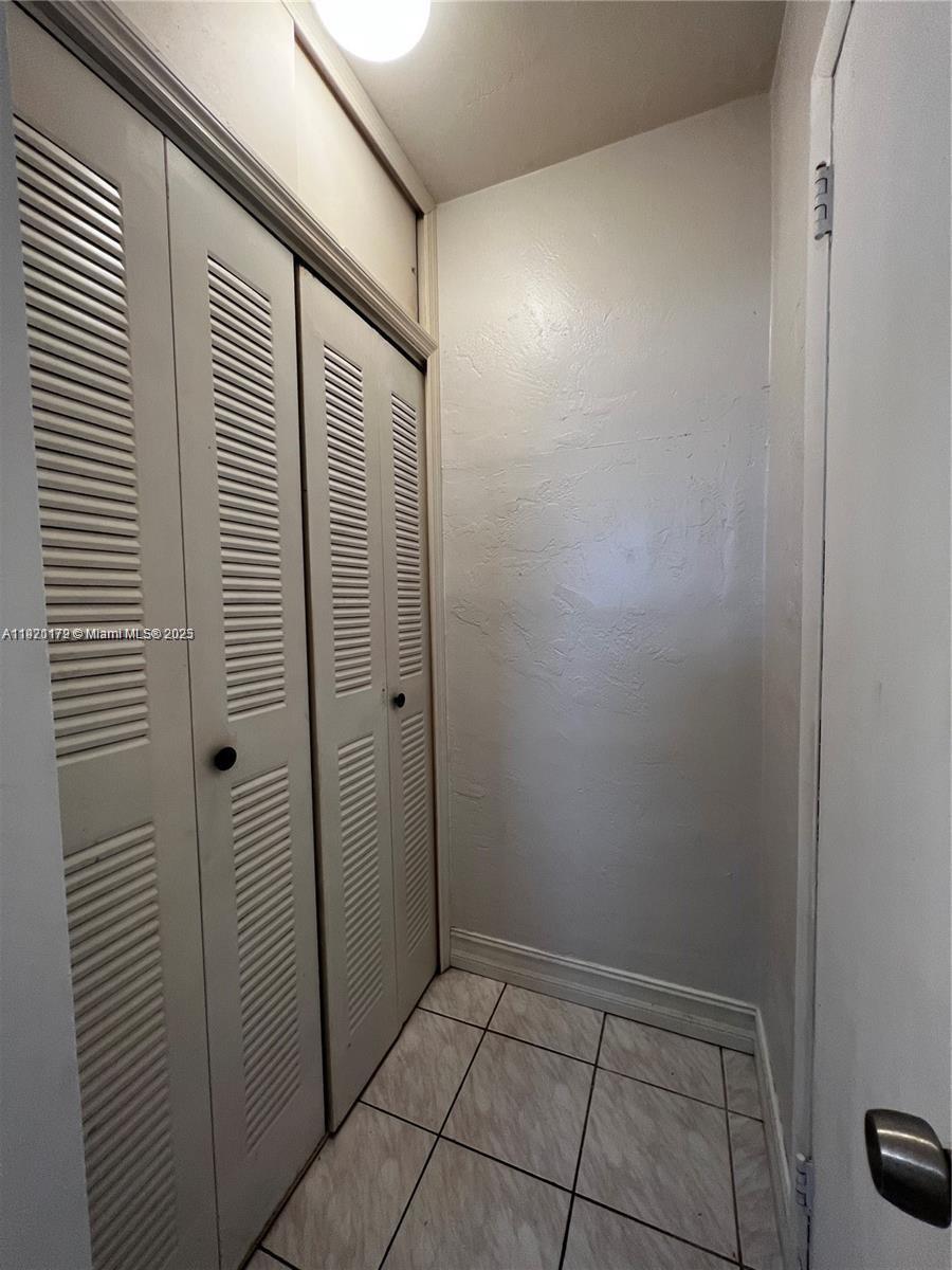 8531 Harding Avenue, Unit 1 Miami Beach, FL 33141 - Photo 10 of 11 a view of bathroom with shower