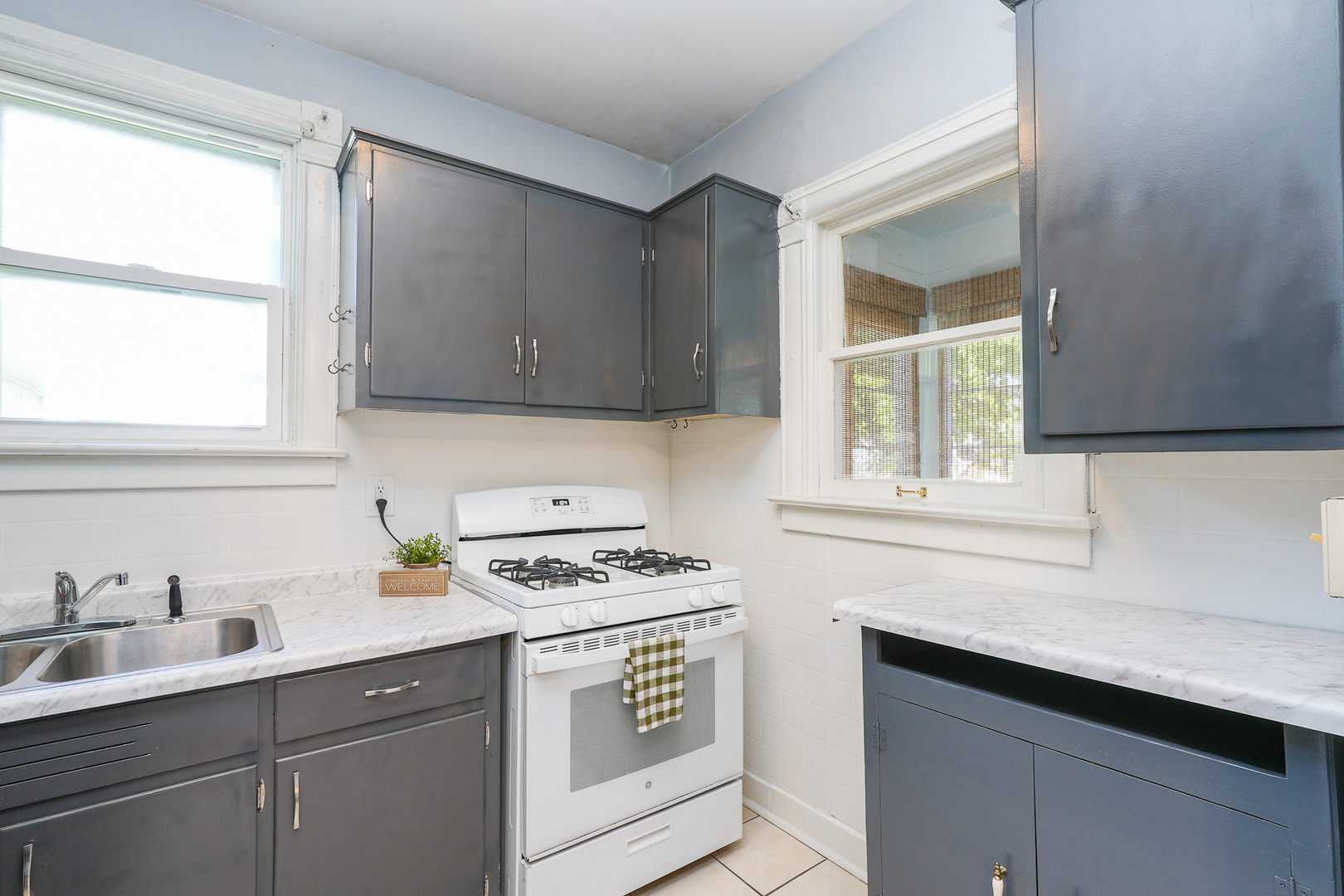 264 West 3rd Street Manteno, IL 60950 - Photo 17 of 29 a kitchen with appliances cabinets and a sink