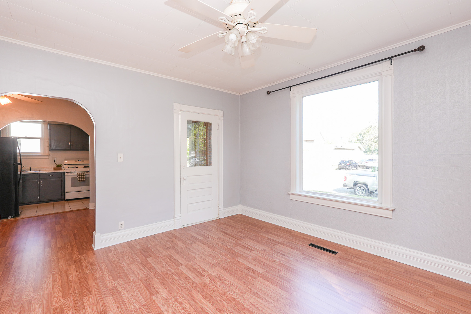 264 West 3rd Street Manteno, IL 60950 - Photo 20 of 29 wooden floor in an empty room with a window