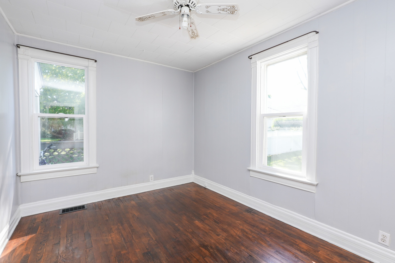 264 West 3rd Street Manteno, IL 60950 - Photo 21 of 29 a view of an empty room with wooden floor and a window