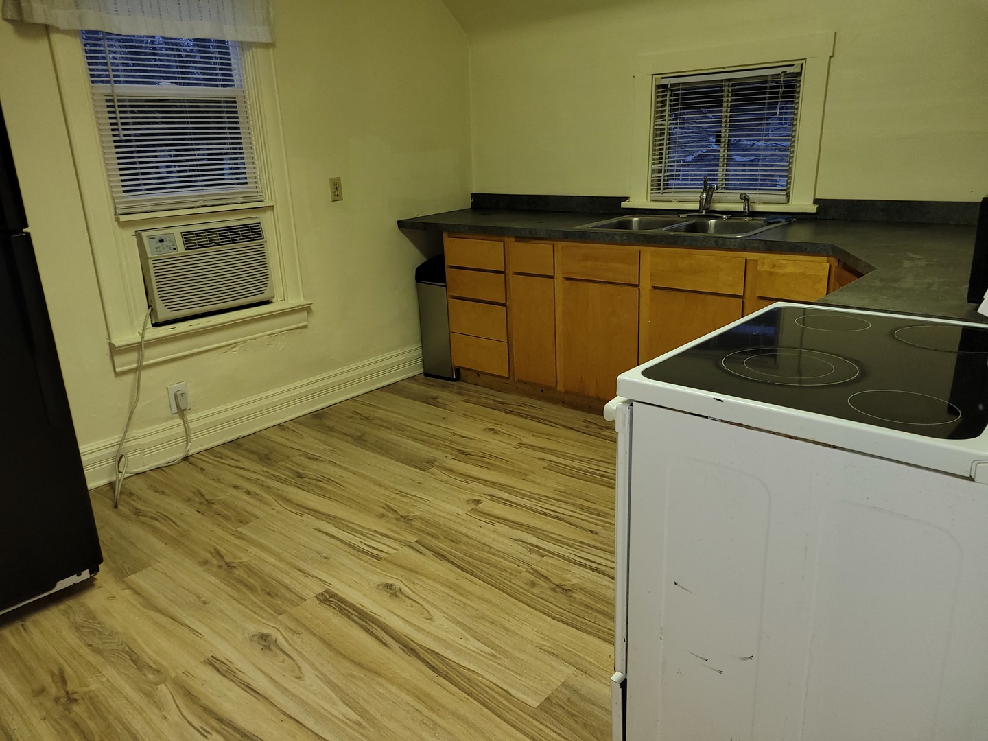 264 West 3rd Street Manteno, IL 60950 - Photo 27 of 29 a kitchen with a sink and a refrigerator
