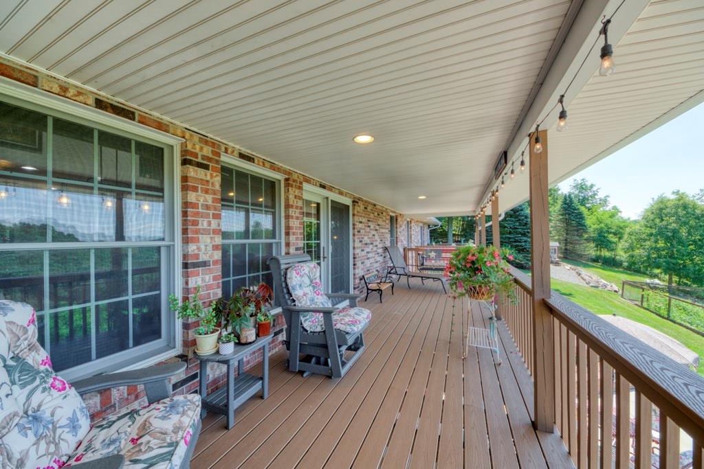 1256 Whitestown Road Prospect, PA 16052 - Photo 21 of 25 a view of a house with backyard porch and wooden floor