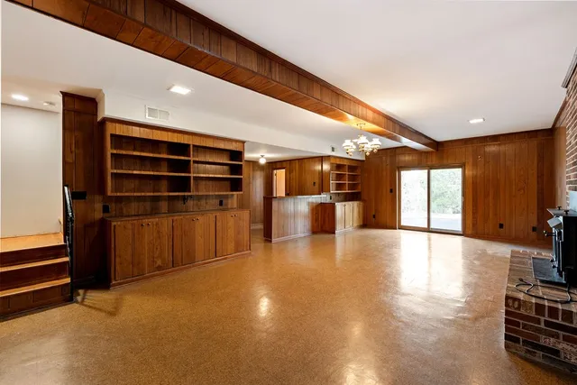 a bathroom with 2 sink and a mirror