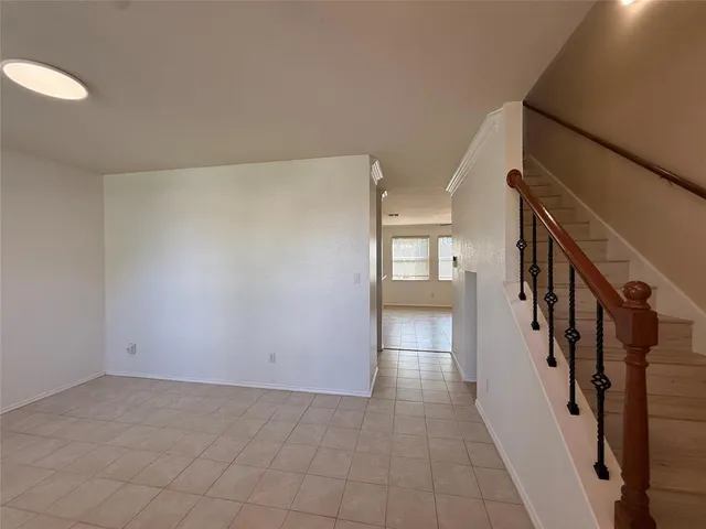 a view of hallway with stairs