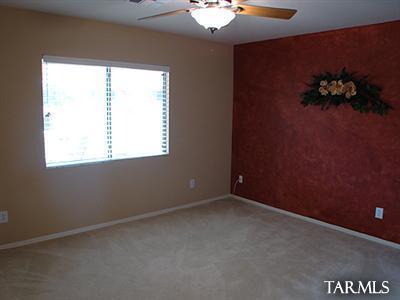 62195 East Northwood Road Tucson, AZ 85739 - Photo 20 of 25 an empty room with a window