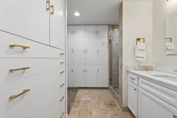 a kitchen with sink cabinets and window