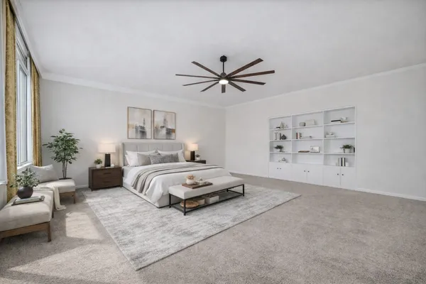a spacious bedroom with a bed and furniture