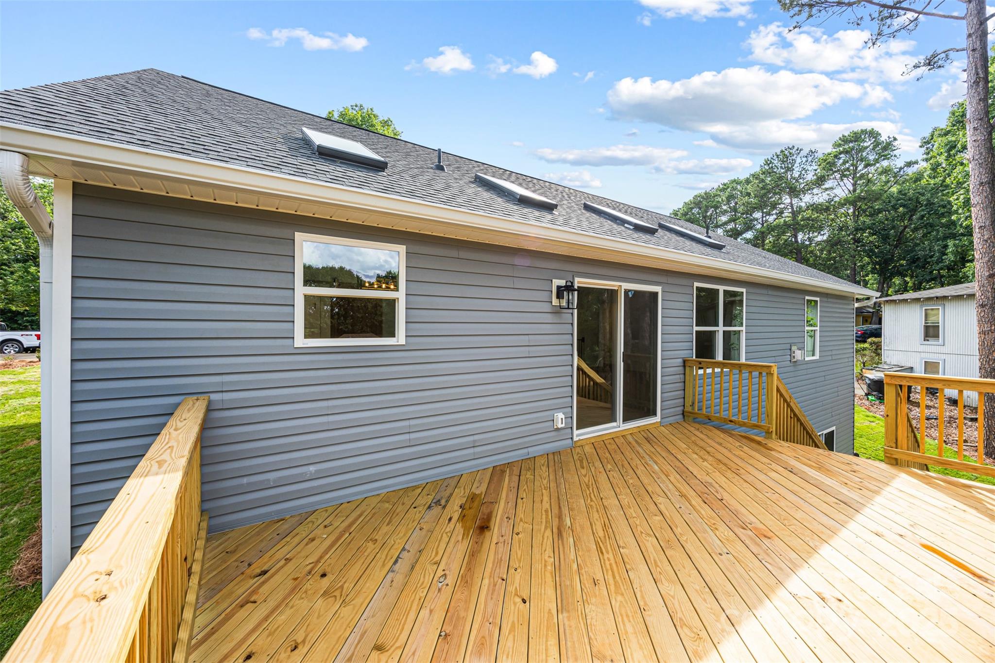 2027 Marquesas Avenue Tega Cay, SC 29708 - Photo 41 of 46 a view of a house with a roof deck