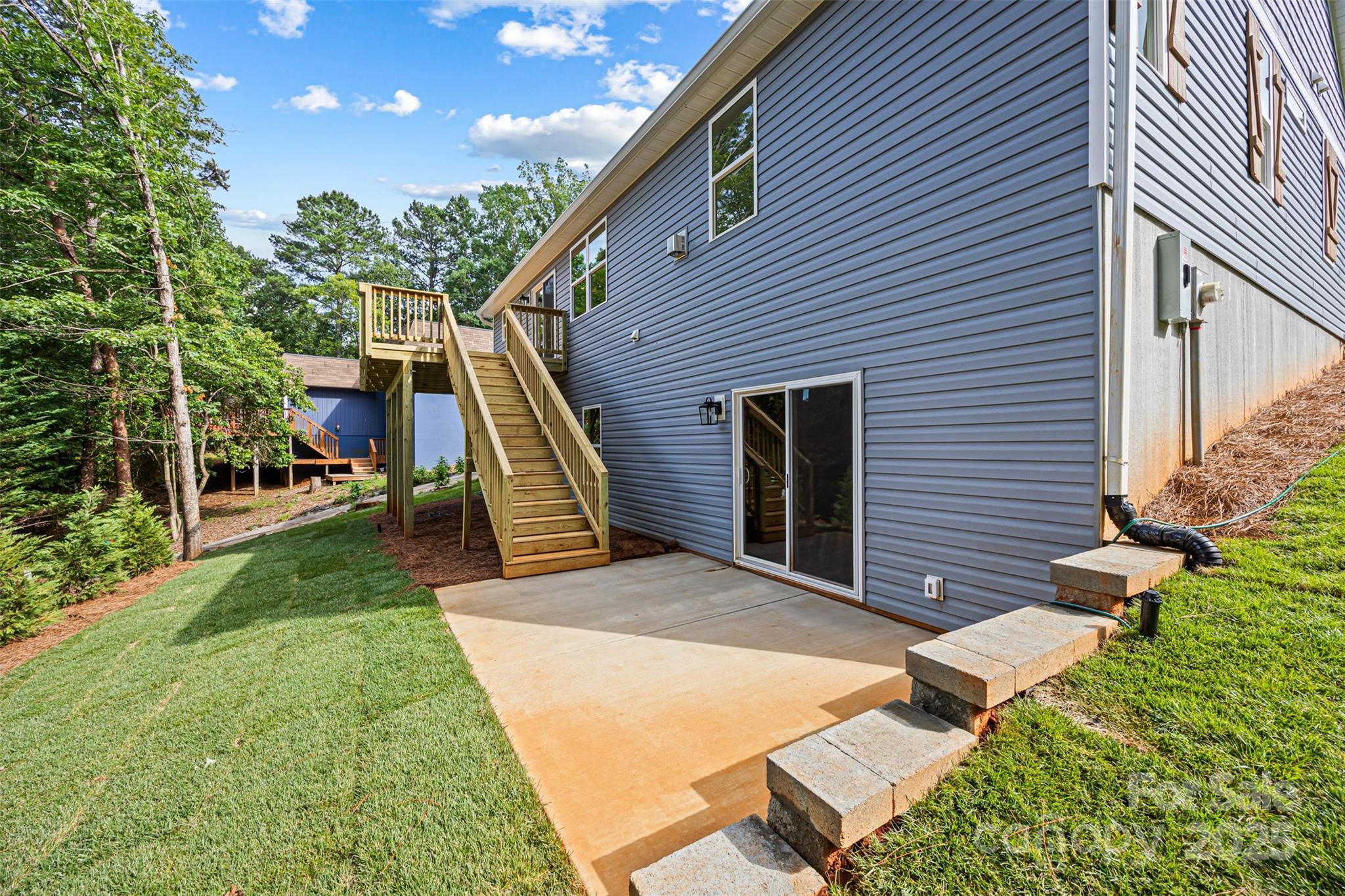 2027 Marquesas Avenue Tega Cay, SC 29708 - Photo 42 of 46 a view of a house with a yard