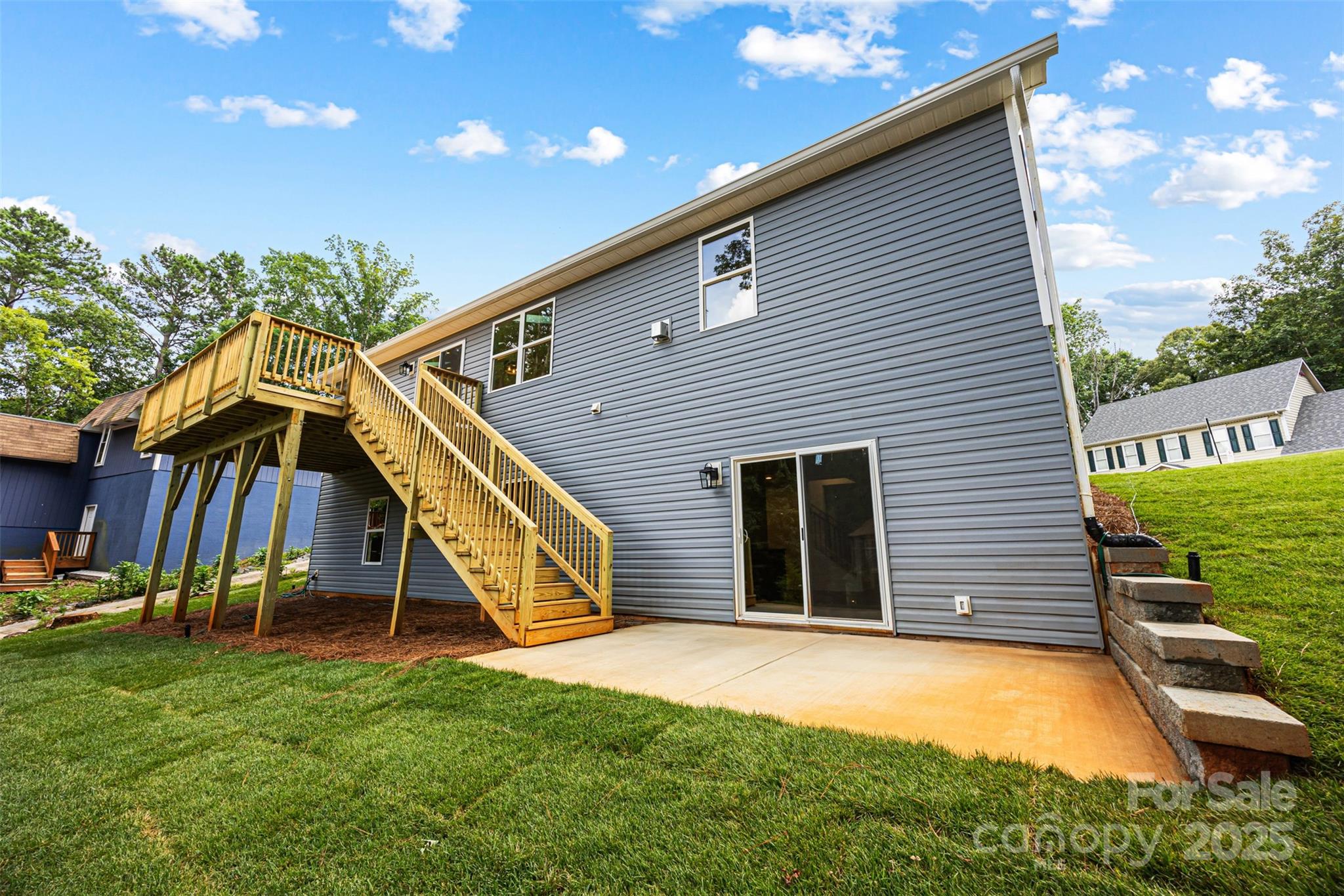 2027 Marquesas Avenue Tega Cay, SC 29708 - Photo 43 of 46 a view of a house with a backyard