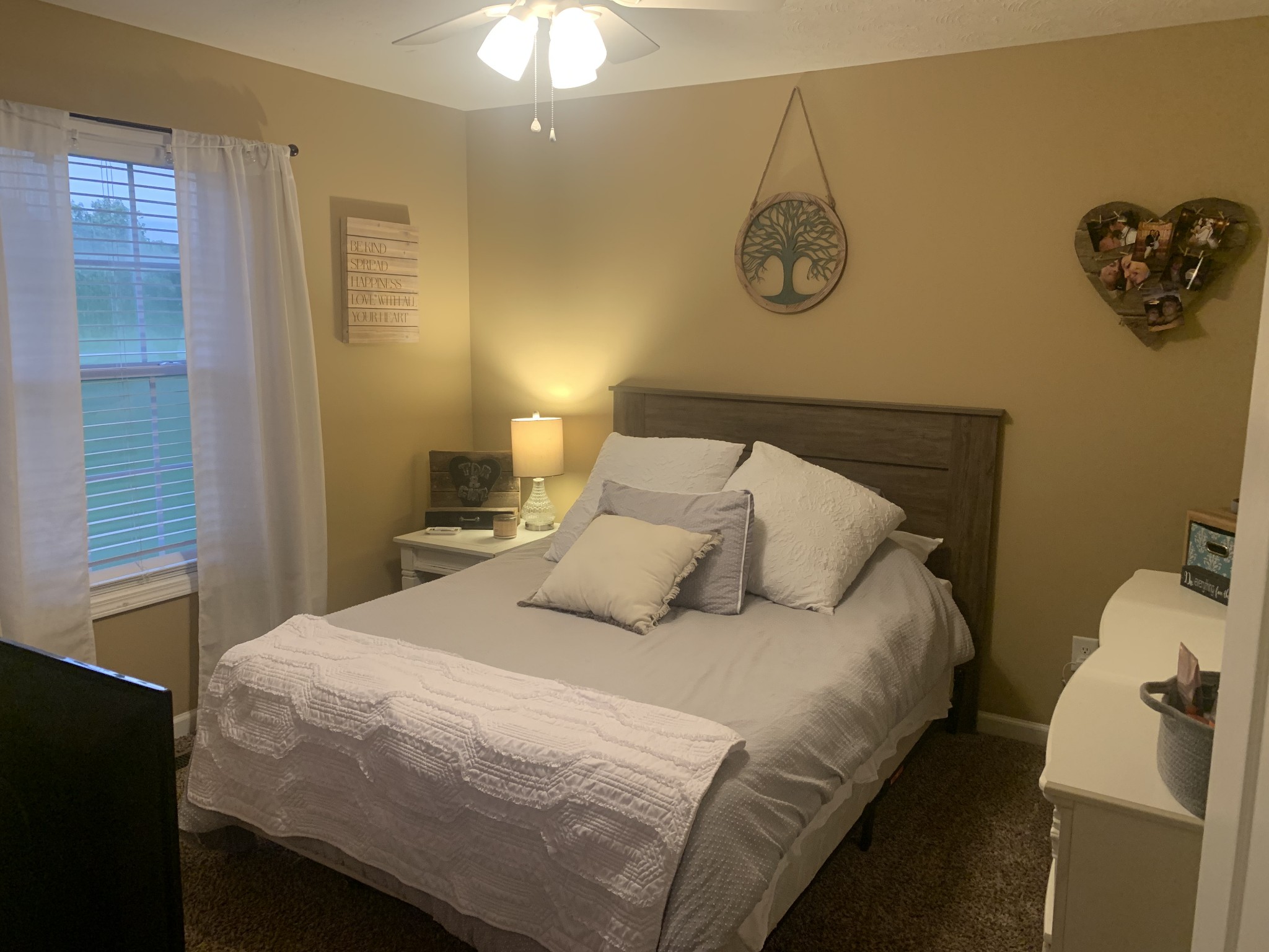 326 Meadows Road Portland, TN 37148 - Photo 29 of 39 a bedroom with a bed and cabinets