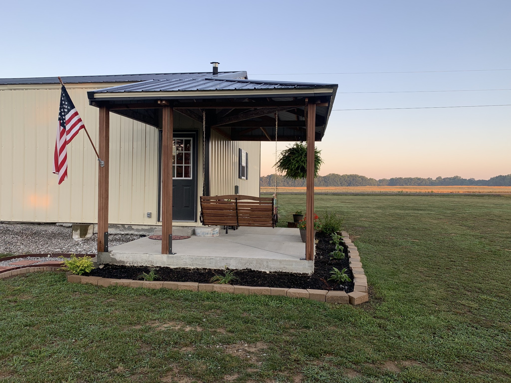326 Meadows Road Portland, TN 37148 - Photo 6 of 39 a view of a patio with a table and chairs