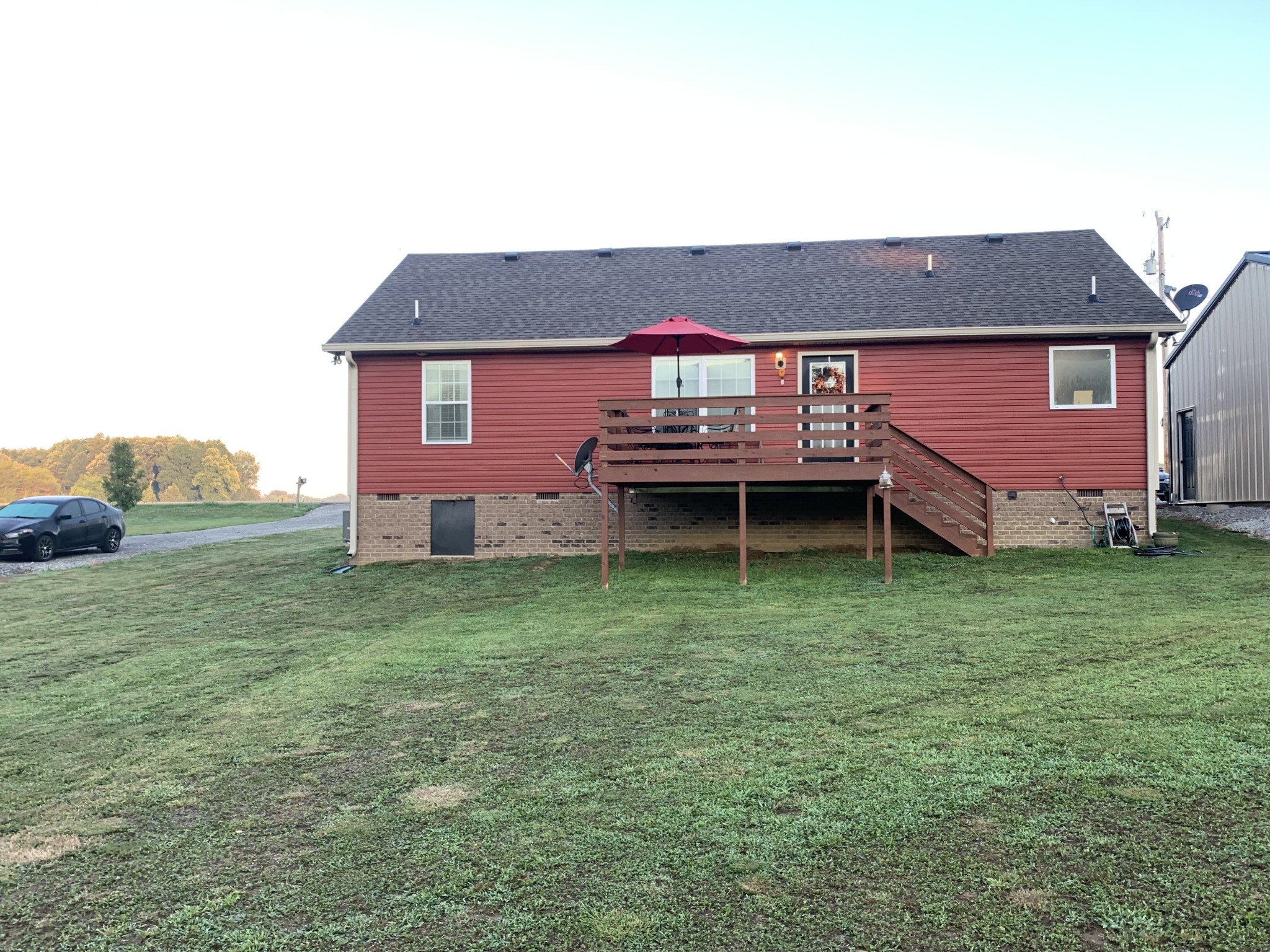 326 Meadows Road Portland, TN 37148 - Photo 9 of 39 a front view of a house with garden