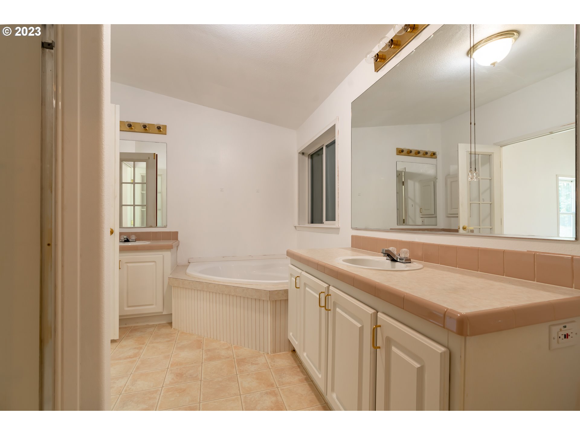 60929 Highway 26 Sandy, OR 97055 - Photo 26 of 38 a bathroom with a sink a toilet and a mirror