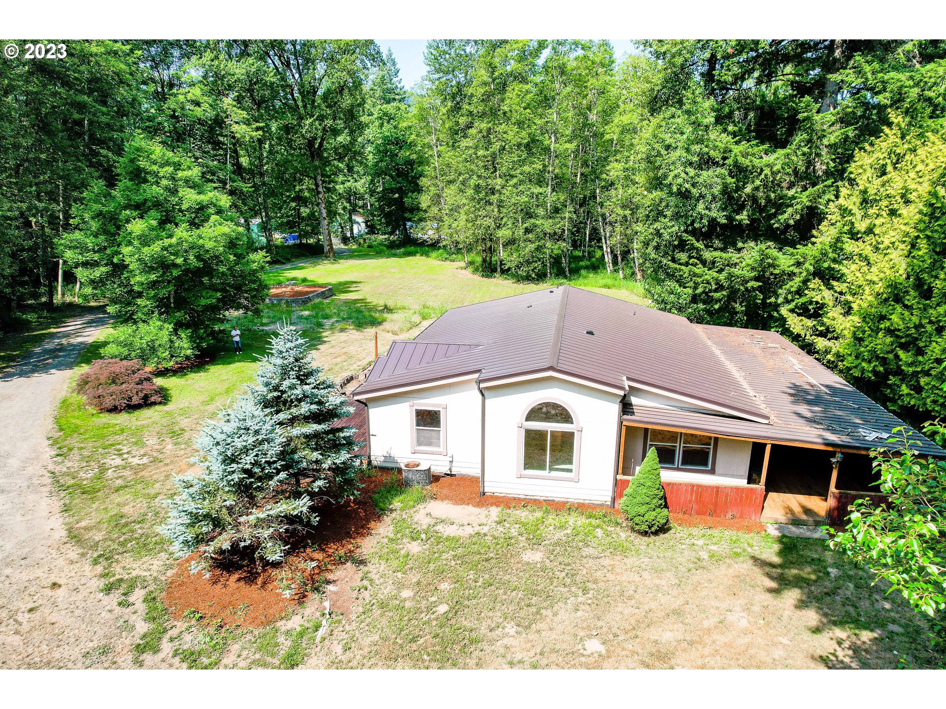 60929 Highway 26 Sandy, OR 97055 - Photo 35 of 38 a aerial view of a house with a yard