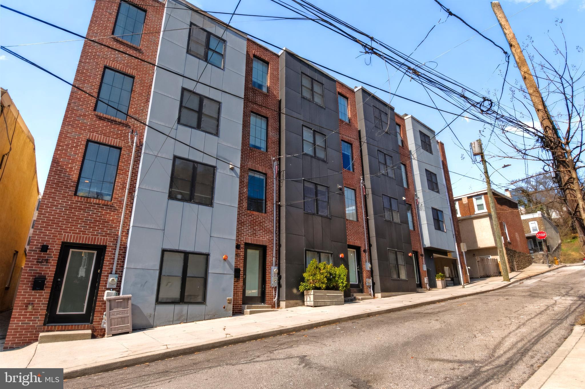 136 Burnside Street Philadelphia, PA 19127 - Photo 1 of 25 a view of a building with a street
