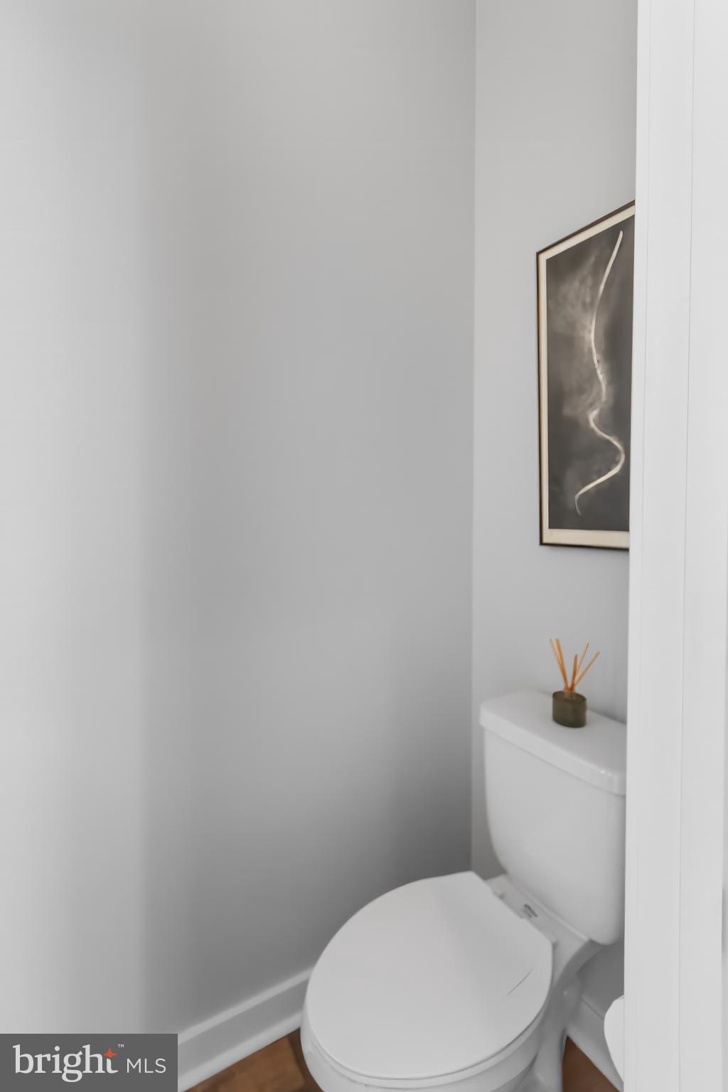 136 Burnside Street Philadelphia, PA 19127 - Photo 11 of 25 a white toilet sitting next to a white wall