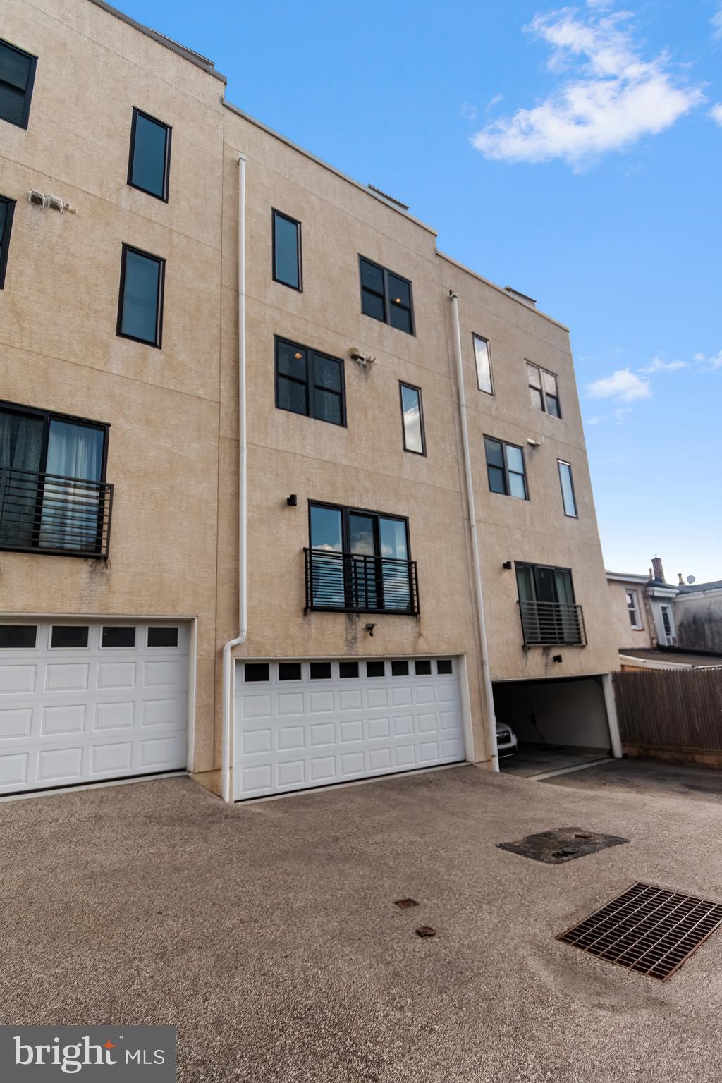 136 Burnside Street Philadelphia, PA 19127 - Photo 24 of 25 a view of a big house with many windows