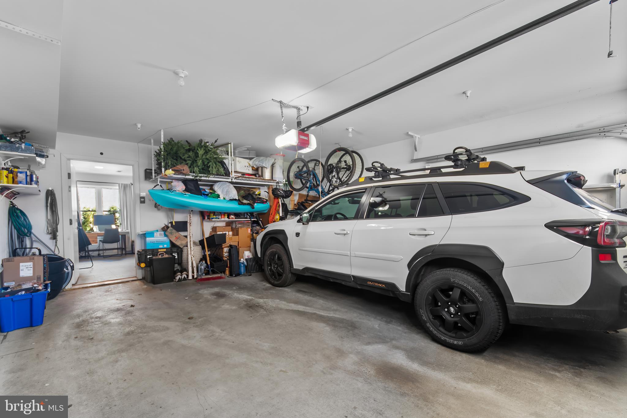 136 Burnside Street Philadelphia, PA 19127 - Photo 5 of 25 a view of a garage with parked cars