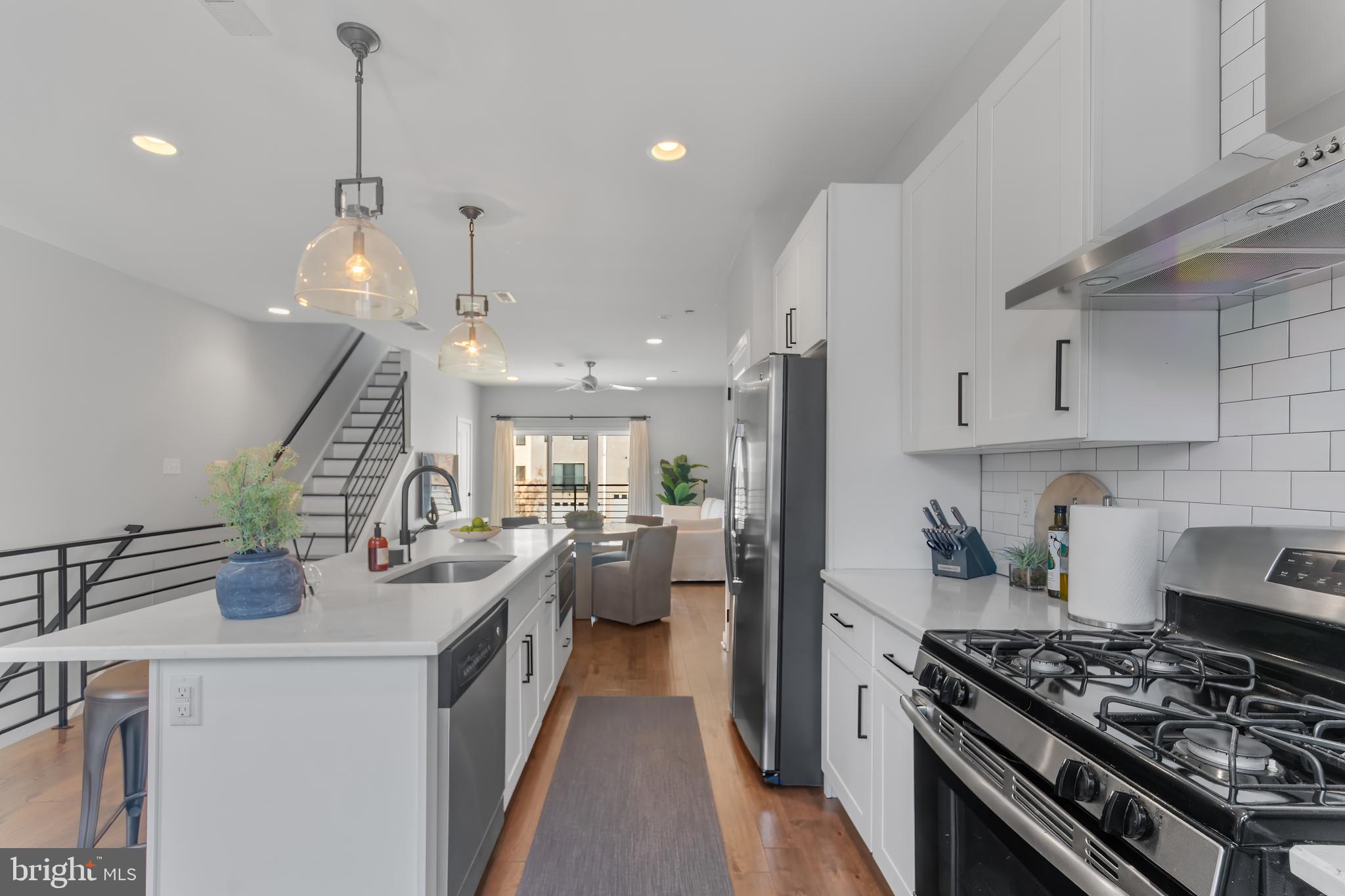 136 Burnside Street Philadelphia, PA 19127 - Photo 7 of 25 a kitchen with stove and refrigerator
