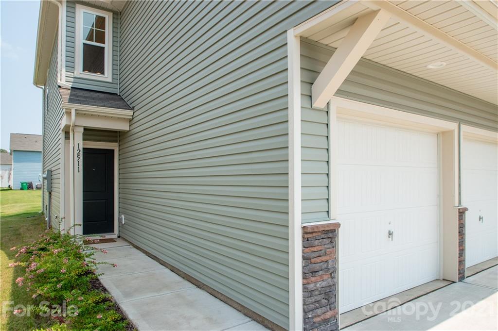 12511 Gotland Road, Unit 313 Midland, NC 28107 - Photo 2 of 31 a view of front door and porch