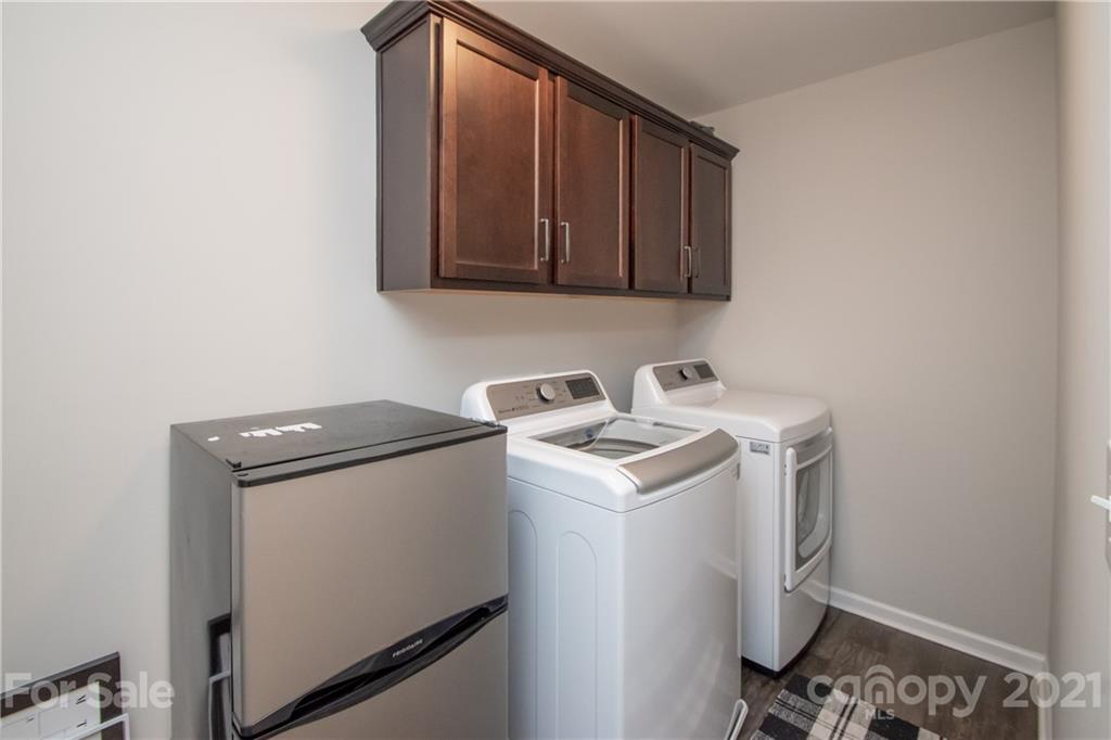 12511 Gotland Road, Unit 313 Midland, NC 28107 - Photo 13 of 31 a utility room with dryer and washer