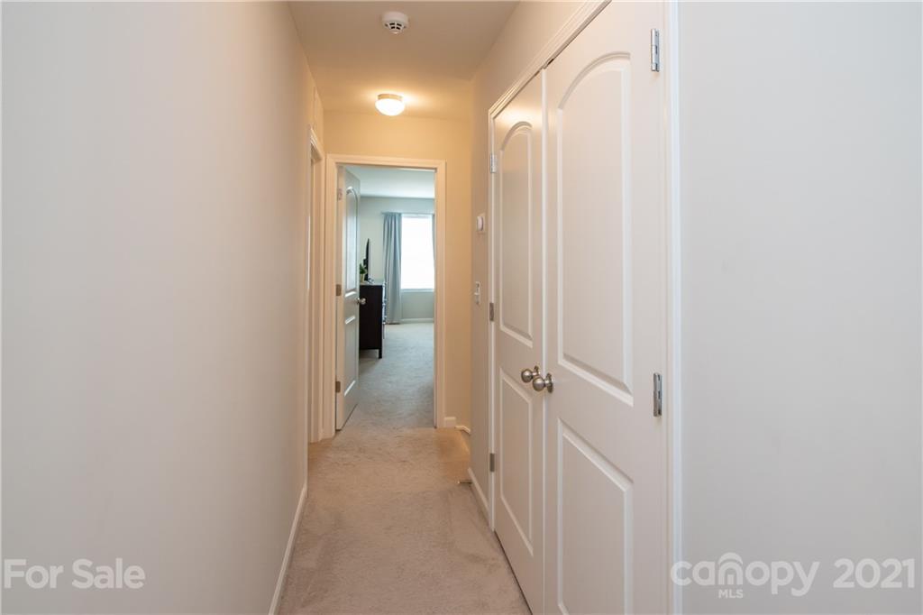 12511 Gotland Road, Unit 313 Midland, NC 28107 - Photo 23 of 31 a view of a bathroom from a hallway