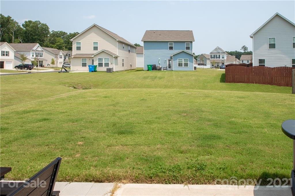 12511 Gotland Road, Unit 313 Midland, NC 28107 - Photo 28 of 31 a view of a house with a big yard